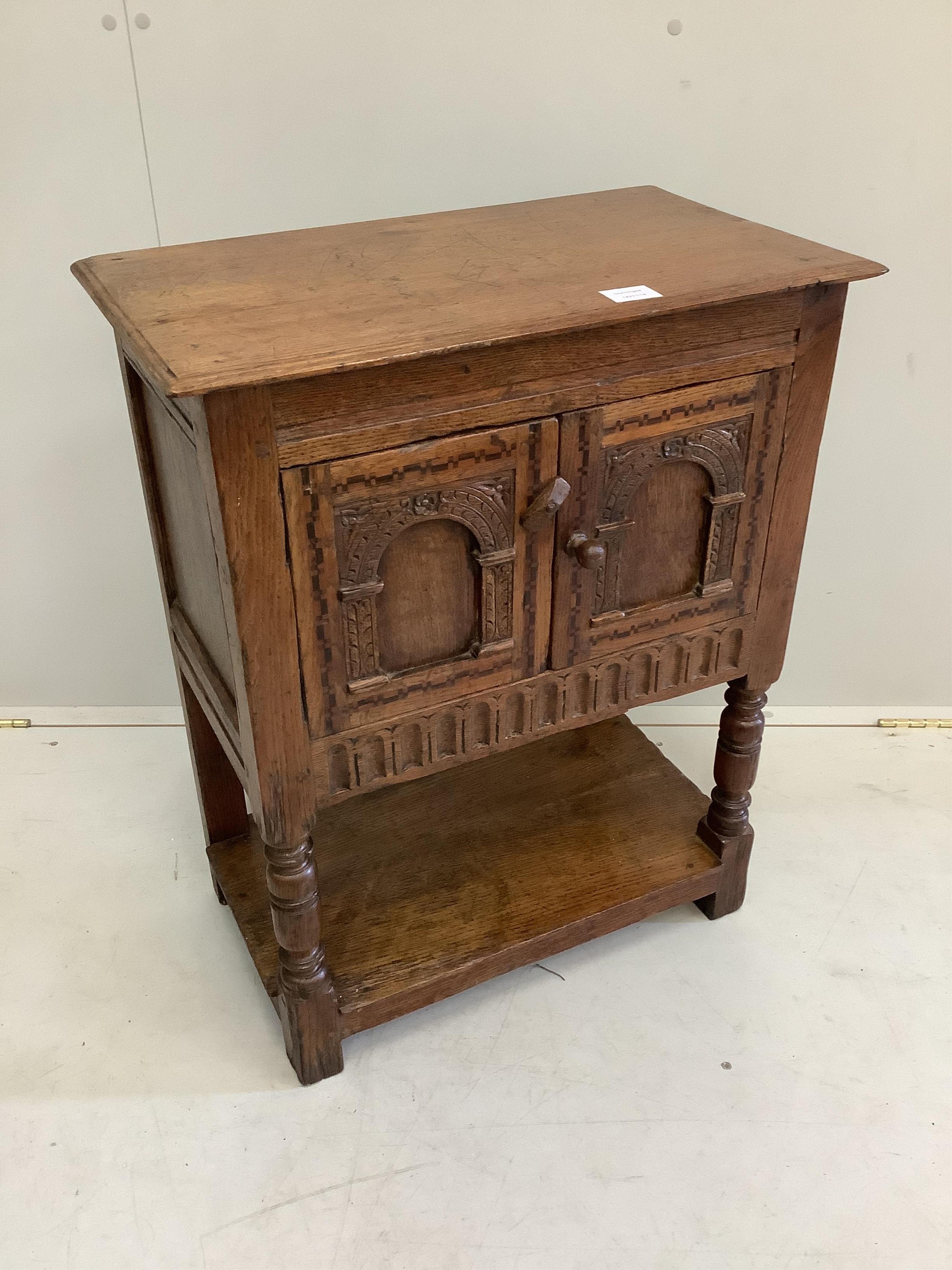 A small 18th century style oak side cabinet, width 60cm, depth 34cm, height 76cm